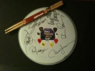 Thin Lizzy Autographed Drumhead with sticks, picks and VIP Pass