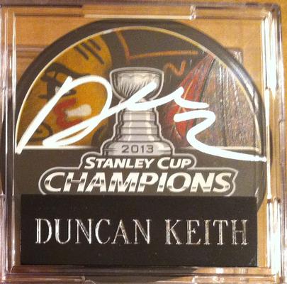 Duncan Keith Autographed 2013 NHL Game Stanley Cup Puck in Case w/cert.