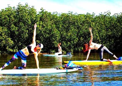 (2) Stand Up Paddle Board Yoga Classes at Koan Wellness