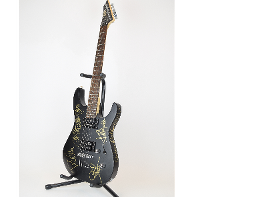 Guitar signed by 80's guitar heroes