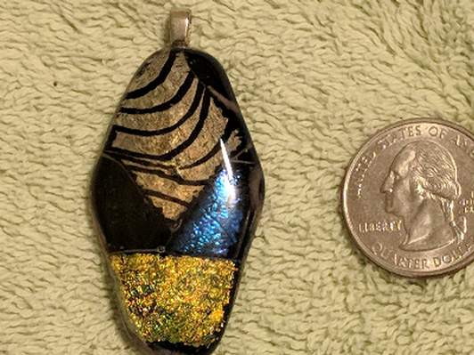 Silver,black and gold pendant