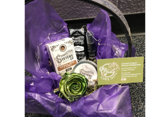 Basket of goodies by Olde Town Flower Shoppe