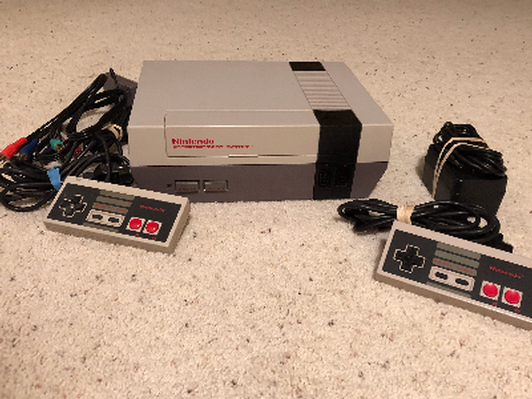 Vintage Nintendo game and 2 controllers