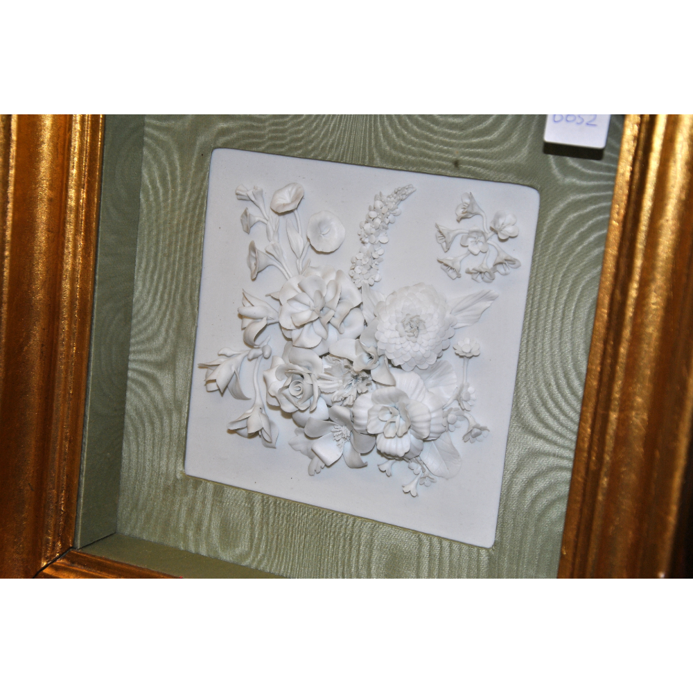 Porcelain flower in a shadow box