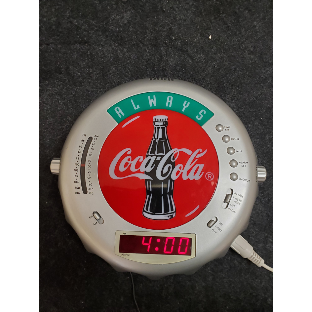 Coca Cola clock, radio, light.