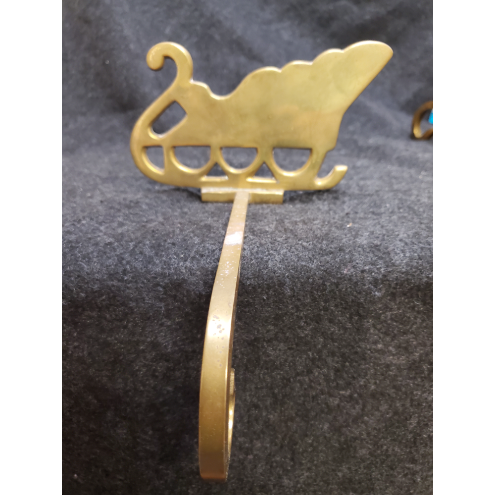 Solid brass sleigh stocking holder