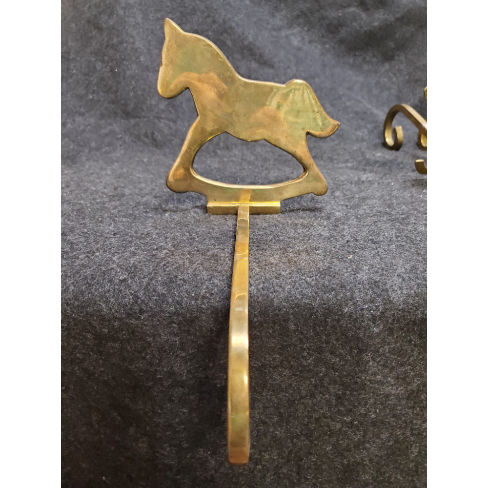 Solid brass rocking horse stocking hanger