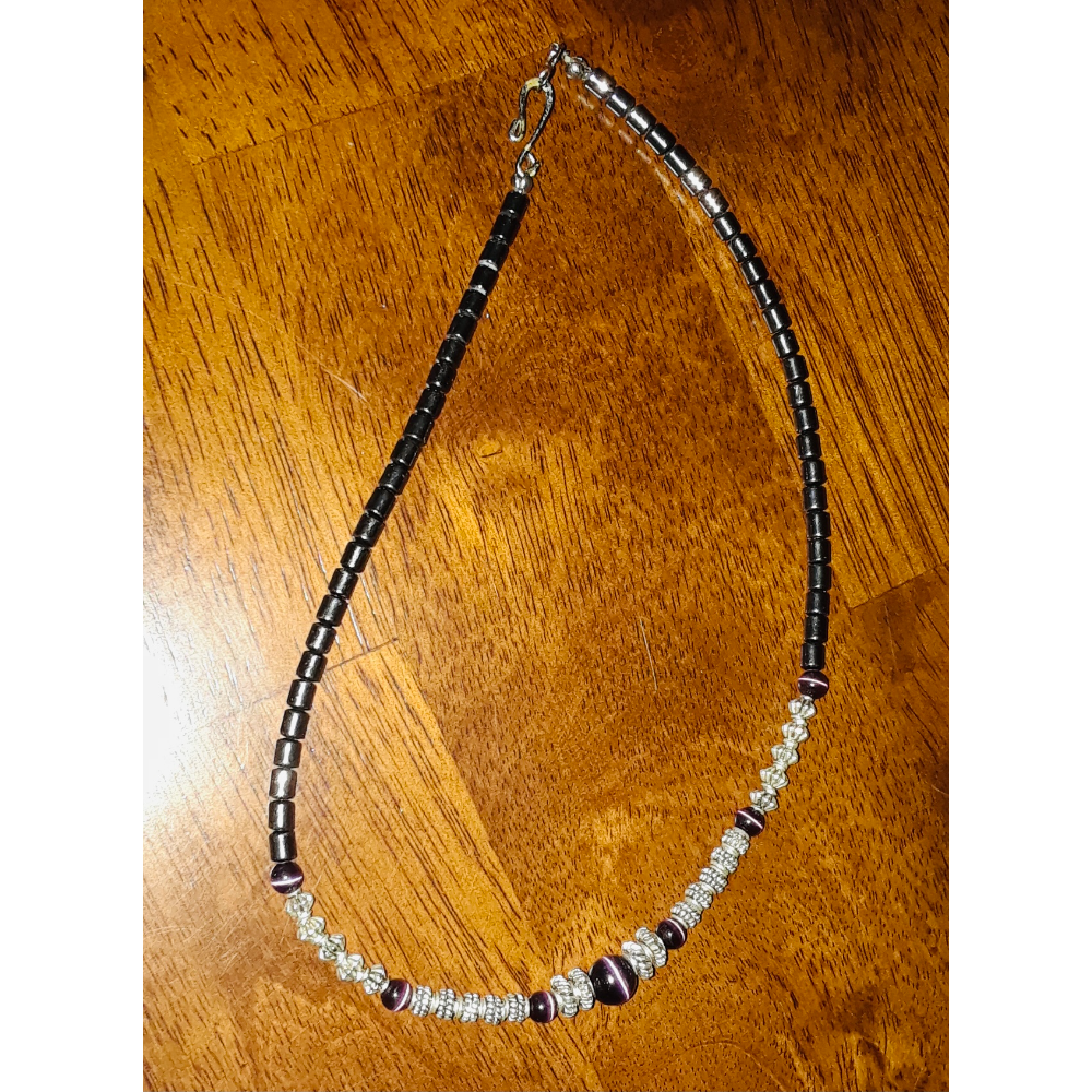 Black beaded necklace with purple beads