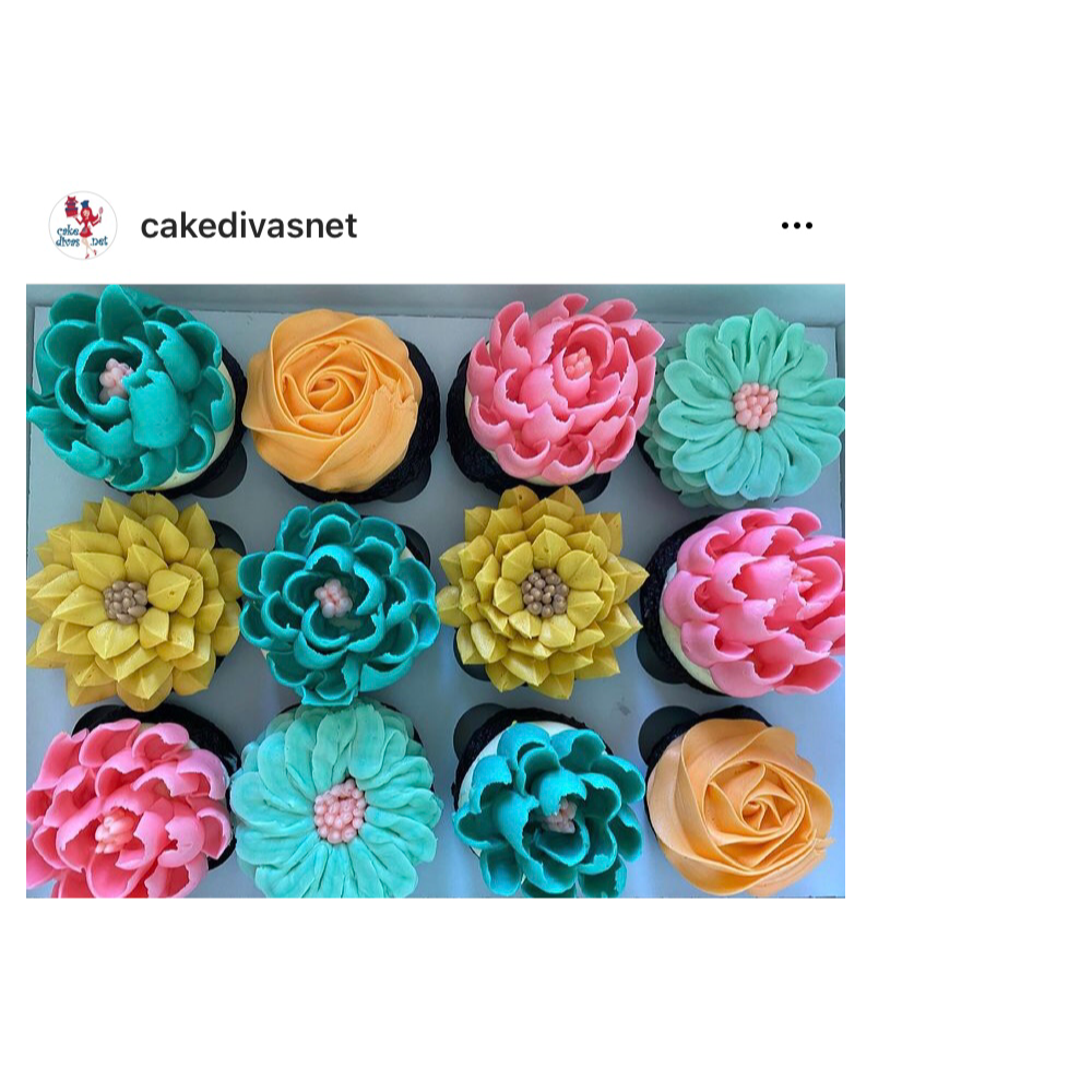 A dozen decorated cupcakes