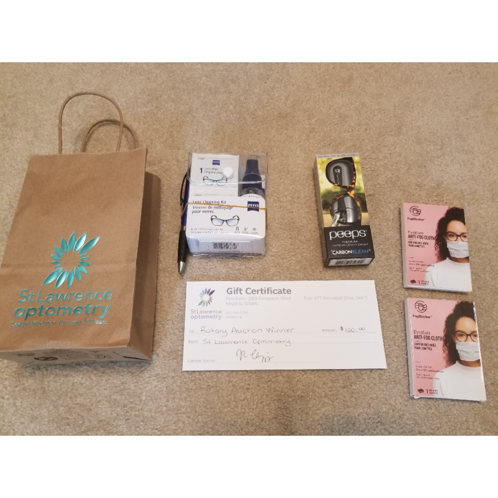 Gift bag containing: $100 gift certificate, Peeps Premium Carbon Lens Cleaner, Zeiss Lens Cleaning Kit, and two FogBlocker eyeglass Anti-fog Cloths donated by St. Lawrence Optometry