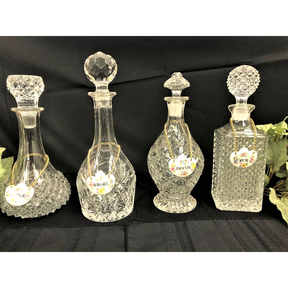 Set of four crystal decanters