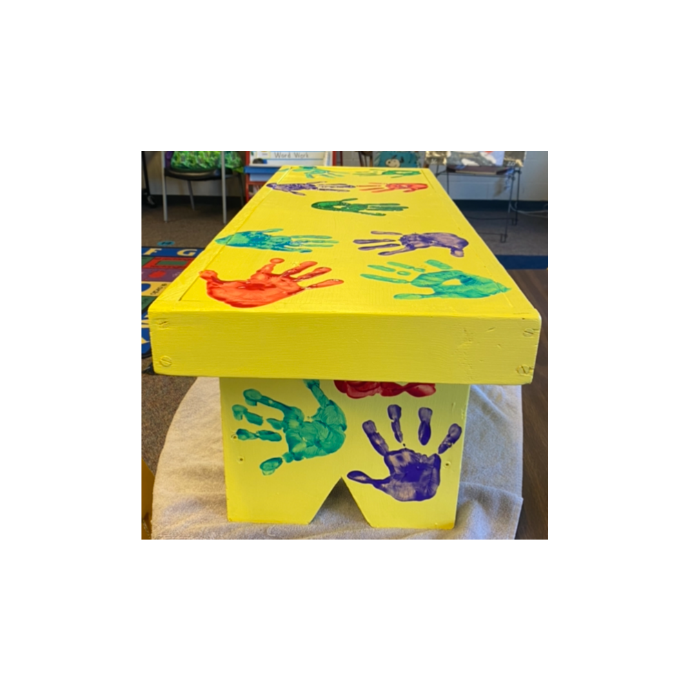 1st Grade Class Project - Painted bench with handprints