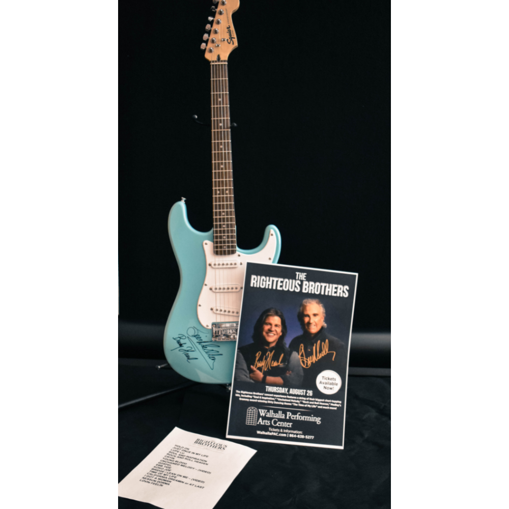 Fender Stratocaster signed by The Righteous Brothers plus set list and signed poster