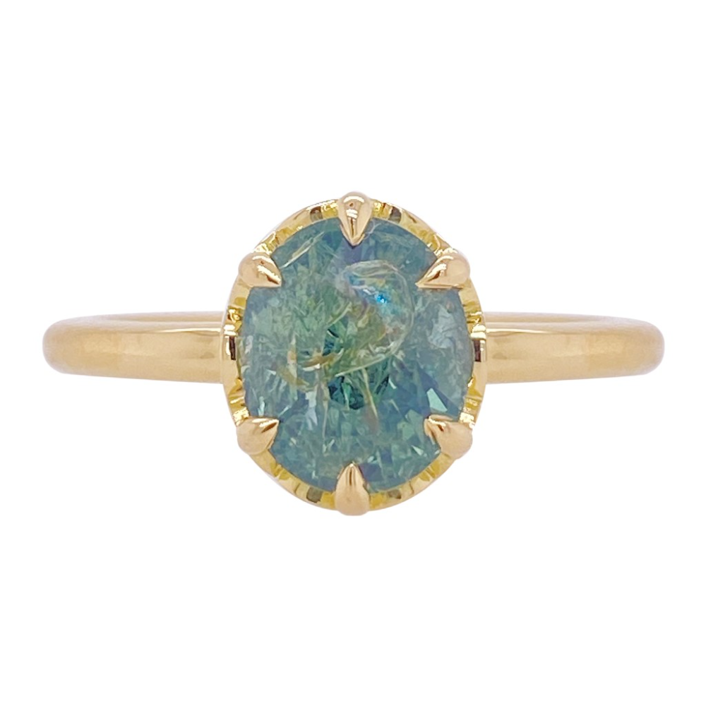 Green sapphire & gold ring