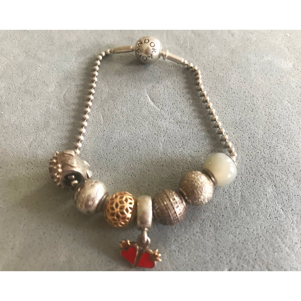 "PANDORA" Bracelet with 7 Charms (almost new), for girls