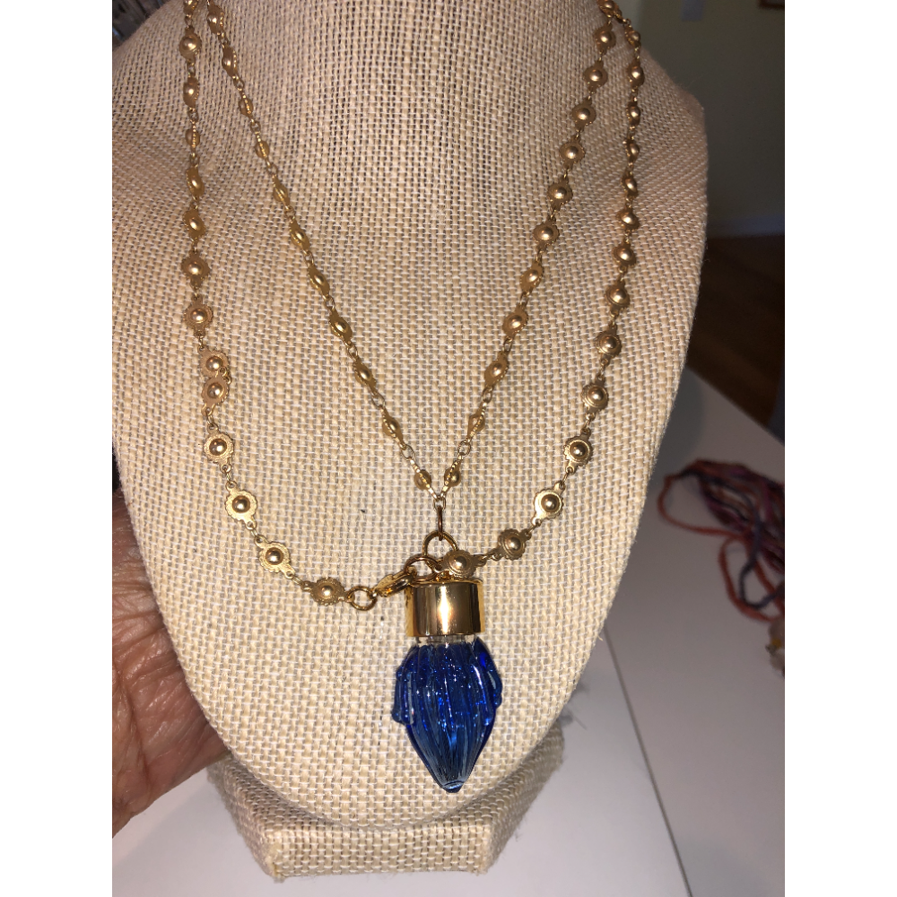 Gold Medallion Link Necklace with Blue EO Bottle