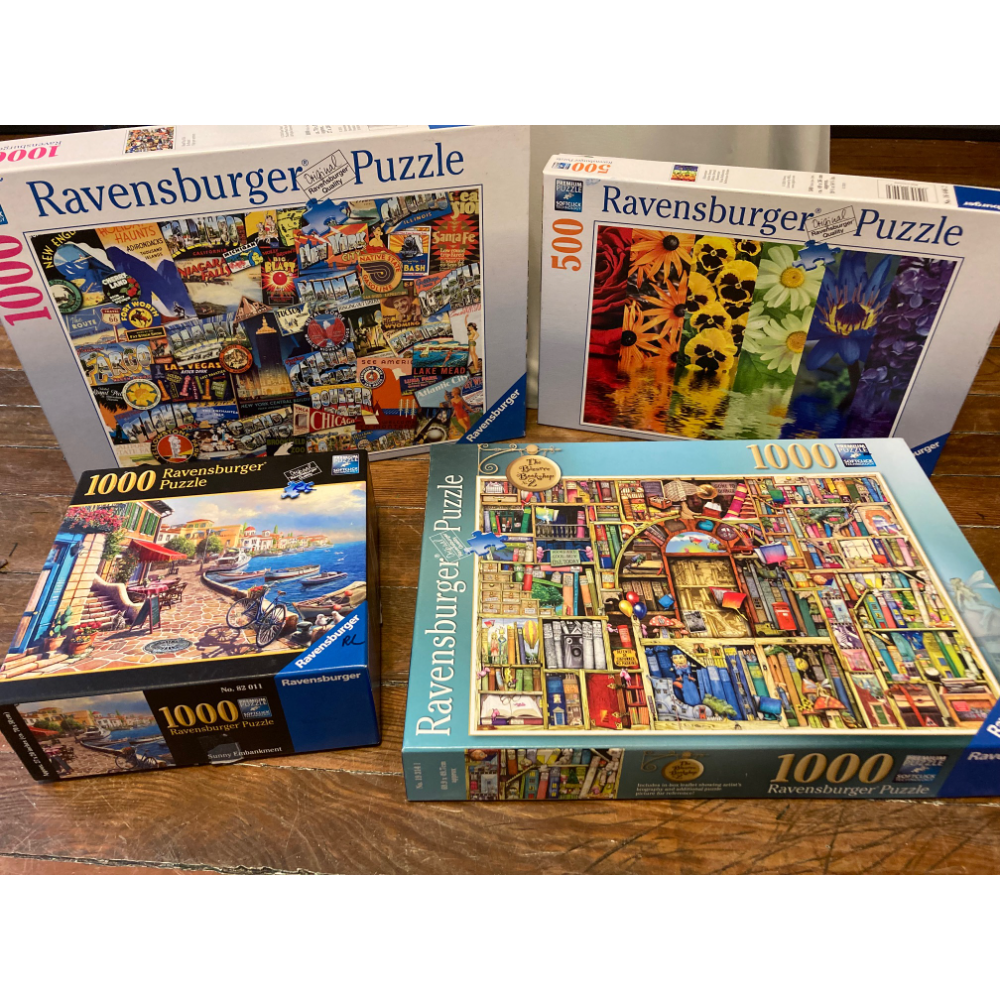Four Ravensburger Puzzles