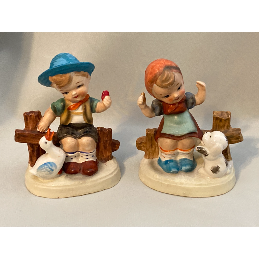 Porcelain Boy and Girl Figurines 
