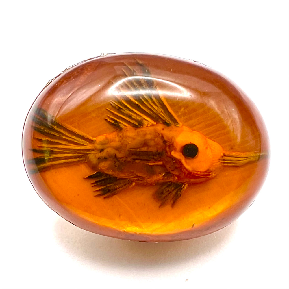 Vintage oval Bakelite on Bakelite fish button.