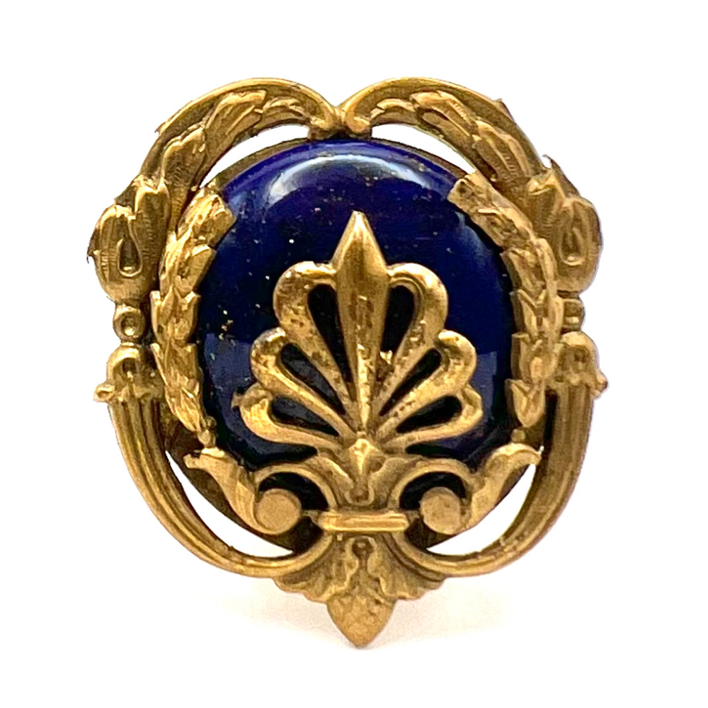 An elaborate 19th c. Glass in floral metal button.