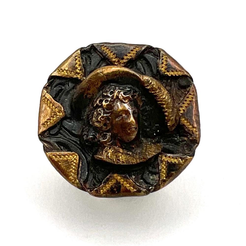 A 19th c. Handkerchief corner button of a woman.