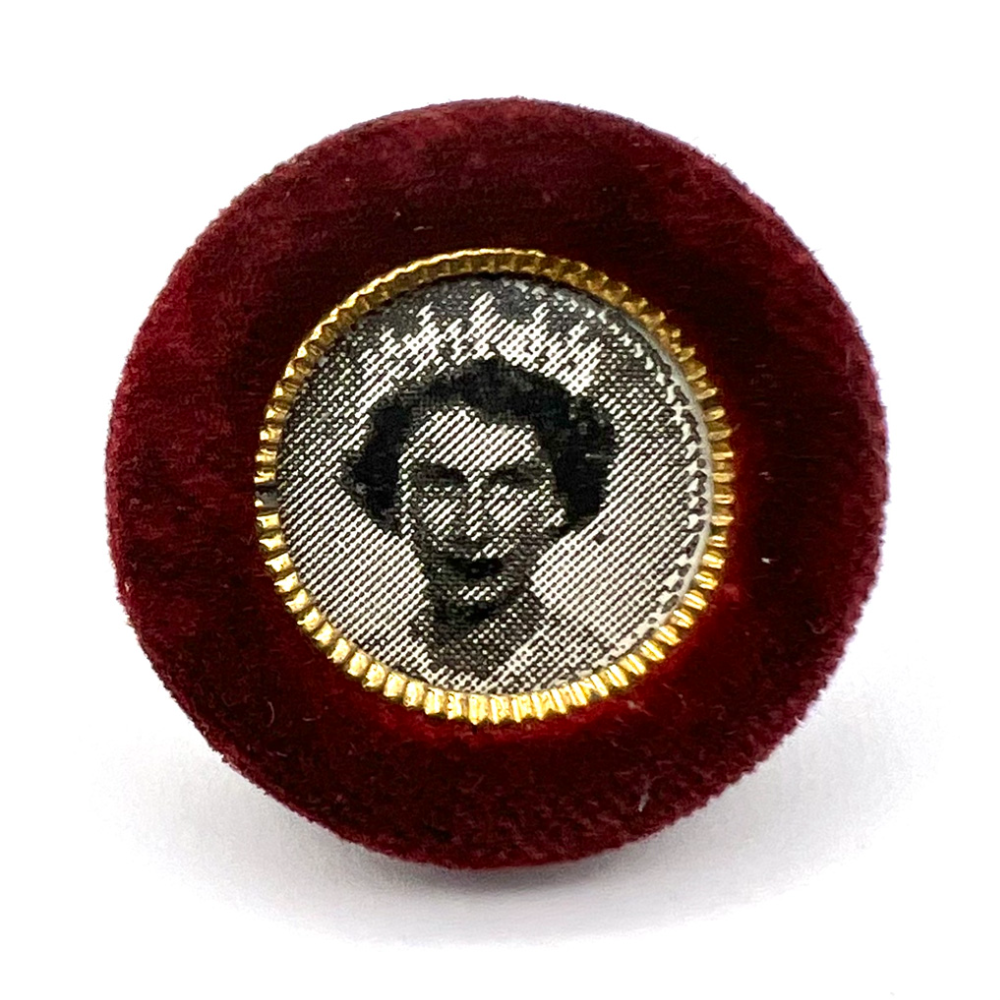 Queen Elizabeth fabric button.