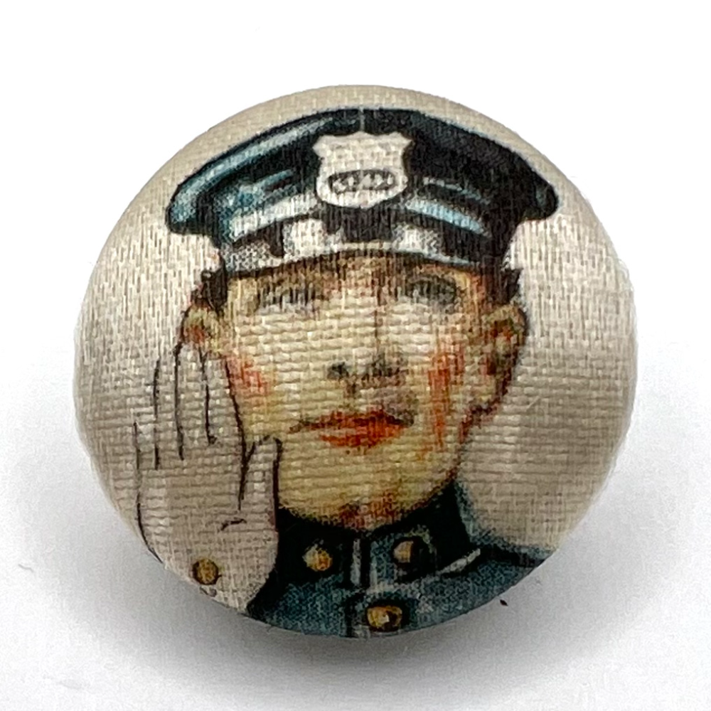 Police man garter button. 