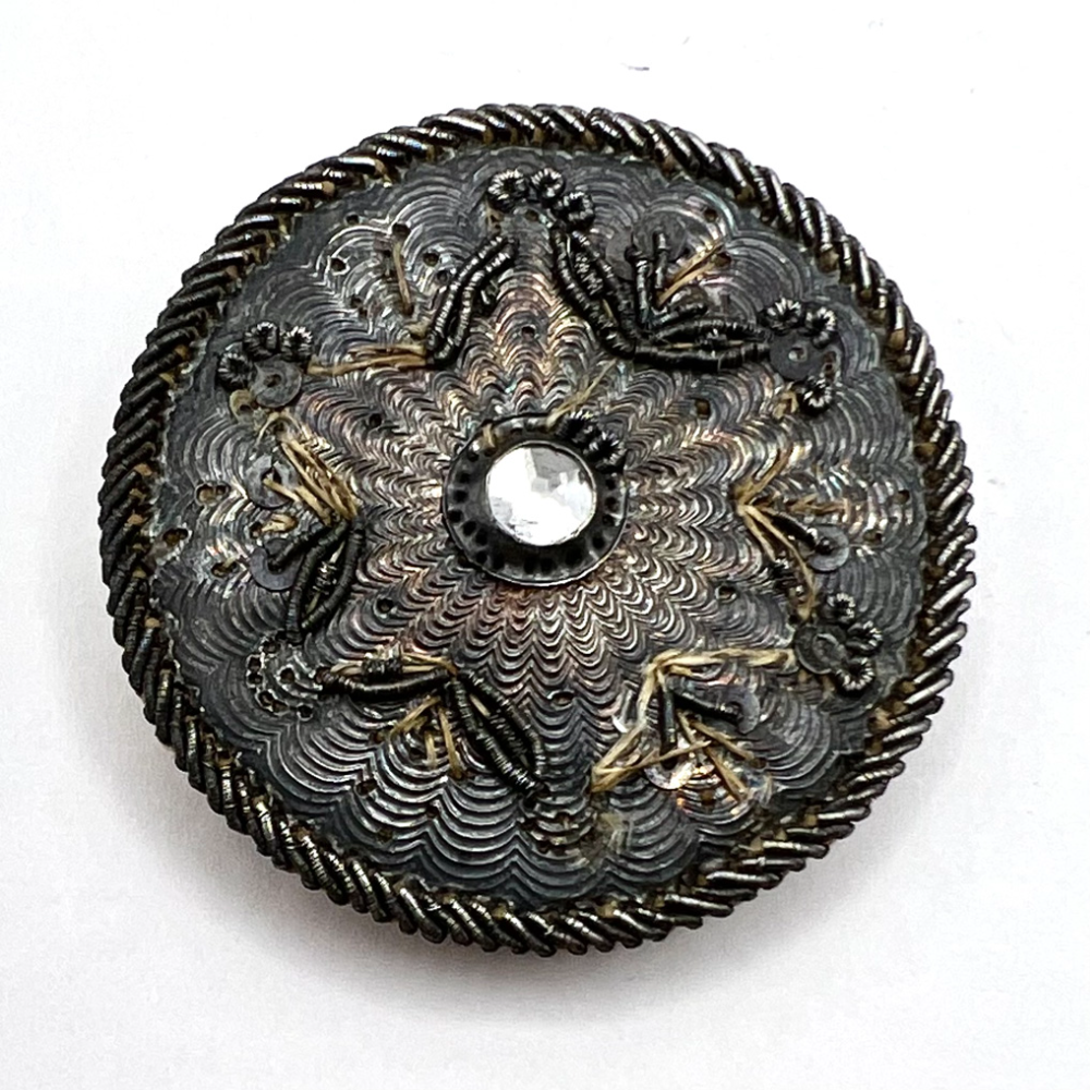 An 18th c. French Passementrie floral button.