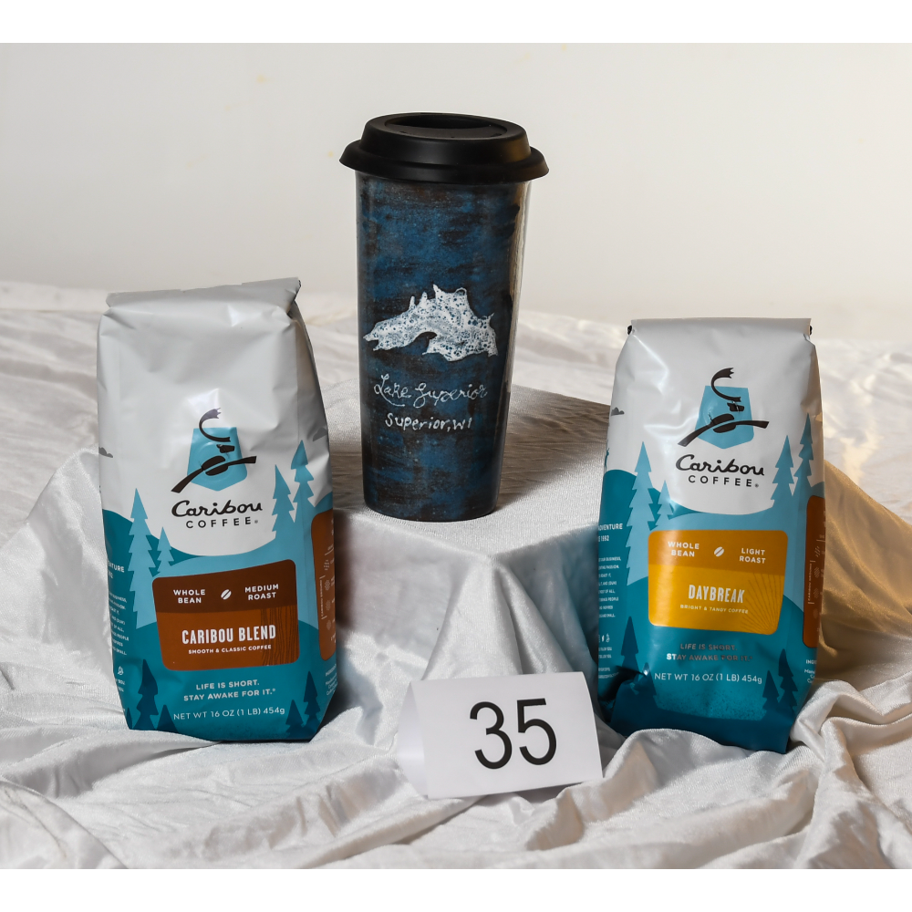 Caribou Coffee -2 bags of coffee with ceramic travel mug