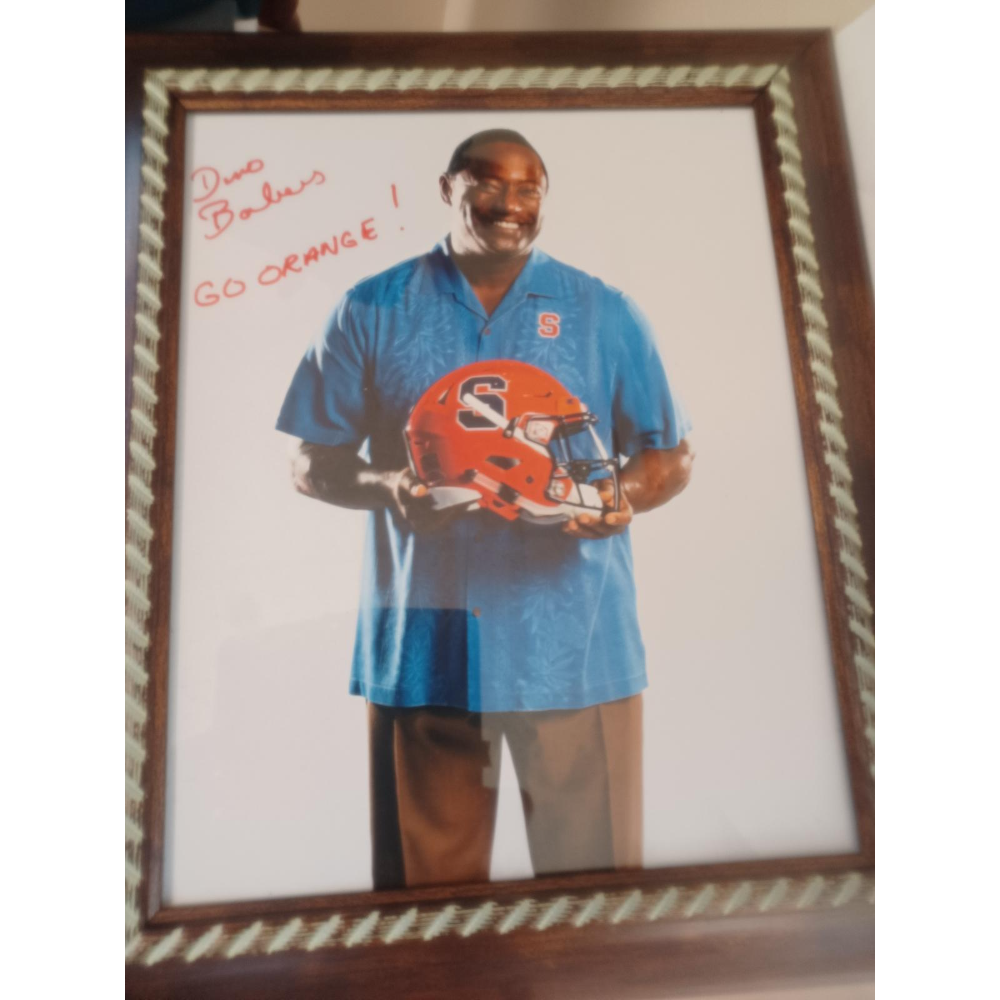SU Football Tickets and an autographed Dino Babers photograph