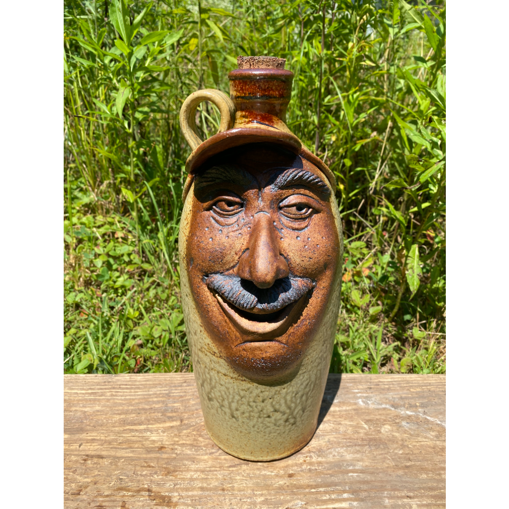 "Face Wearing a Baseball Cap" Ceramic Stoneware Jug 